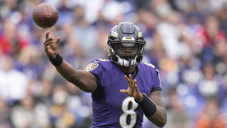 Oct 23, 2022; Baltimore, Maryland, USA;  Baltimore Ravens quarterback Lamar Jackson (8) throws the ball against the Cleveland Browns during the first half at M&T Bank Stadium. Mandatory Credit: Jessica Rapfogel-USA TODAY Sports