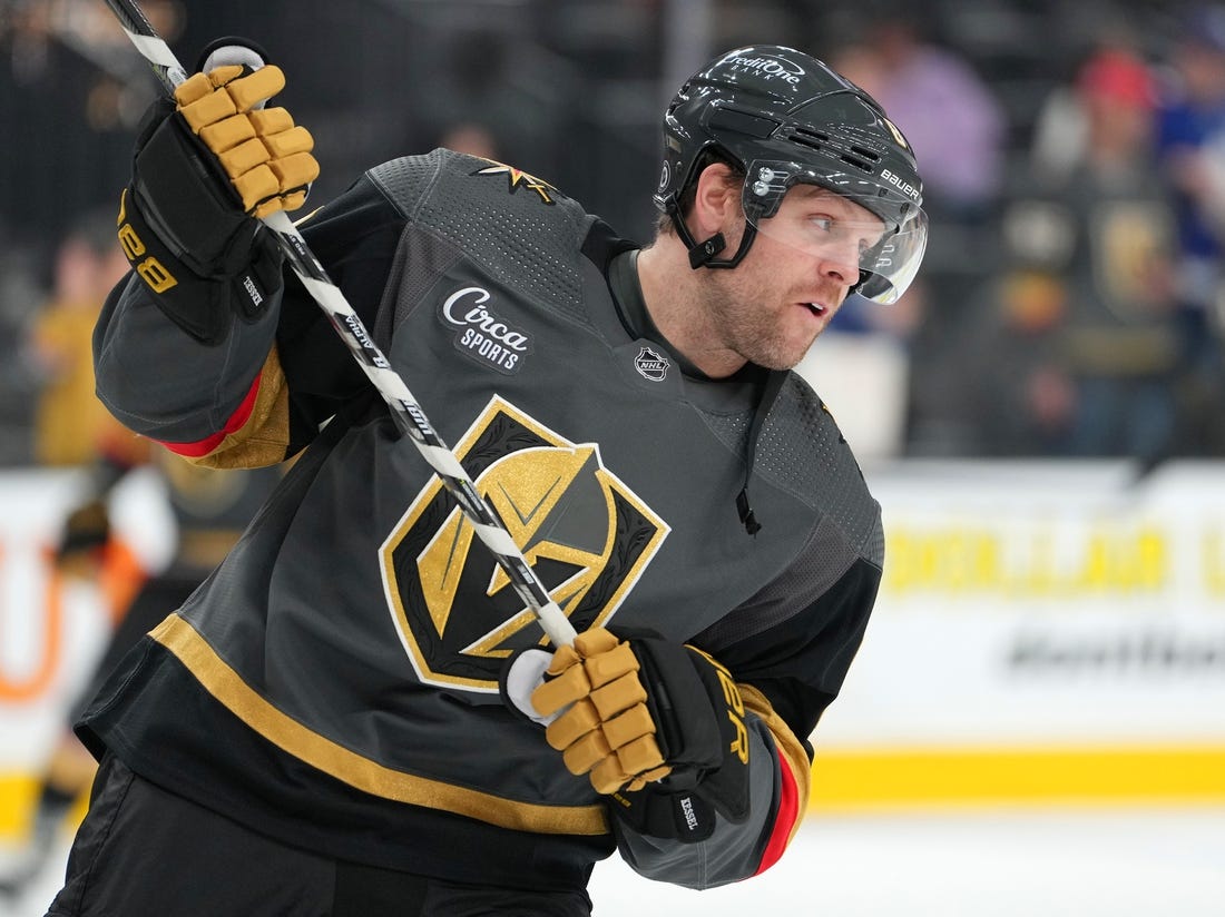 Oct 24, 2022; Las Vegas, Nevada, USA; Vegas Golden Knights center Phil Kessel (8) warms up before a game against the Toronto Maple Leafs at T-Mobile Arena. Mandatory Credit: Stephen R. Sylvanie-USA TODAY Sports