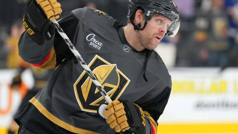 Oct 24, 2022; Las Vegas, Nevada, USA; Vegas Golden Knights center Phil Kessel (8) warms up before a game against the Toronto Maple Leafs at T-Mobile Arena. Mandatory Credit: Stephen R. Sylvanie-USA TODAY Sports