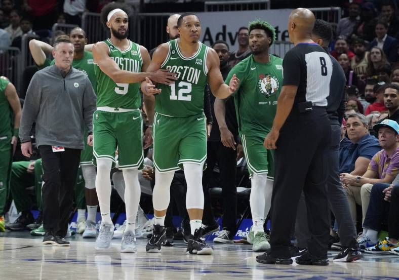 Oct 24, 2022; Chicago, Illinois, USA; Boston Celtics forward Grant Williams (12) reacts after being thrown out for getting his second technical foul of the game against the Chicago Bulls during the second half at United Center. Mandatory Credit: David Banks-USA TODAY Sports
