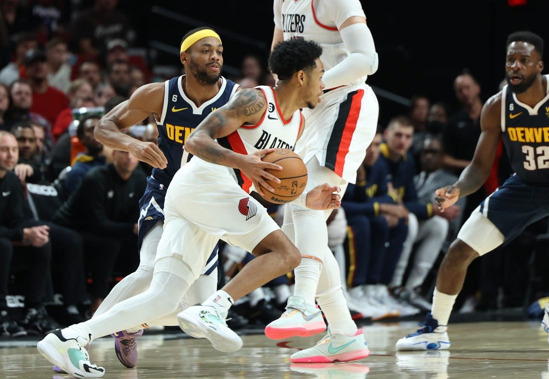 Oct 24, 2022; Portland, Oregon, USA;  Portland Trail Blazers guard Anfernee Simons (1) dribbles against the Denver Nuggets in the second half at Moda Center. Mandatory Credit: Jaime Valdez-USA TODAY Sports