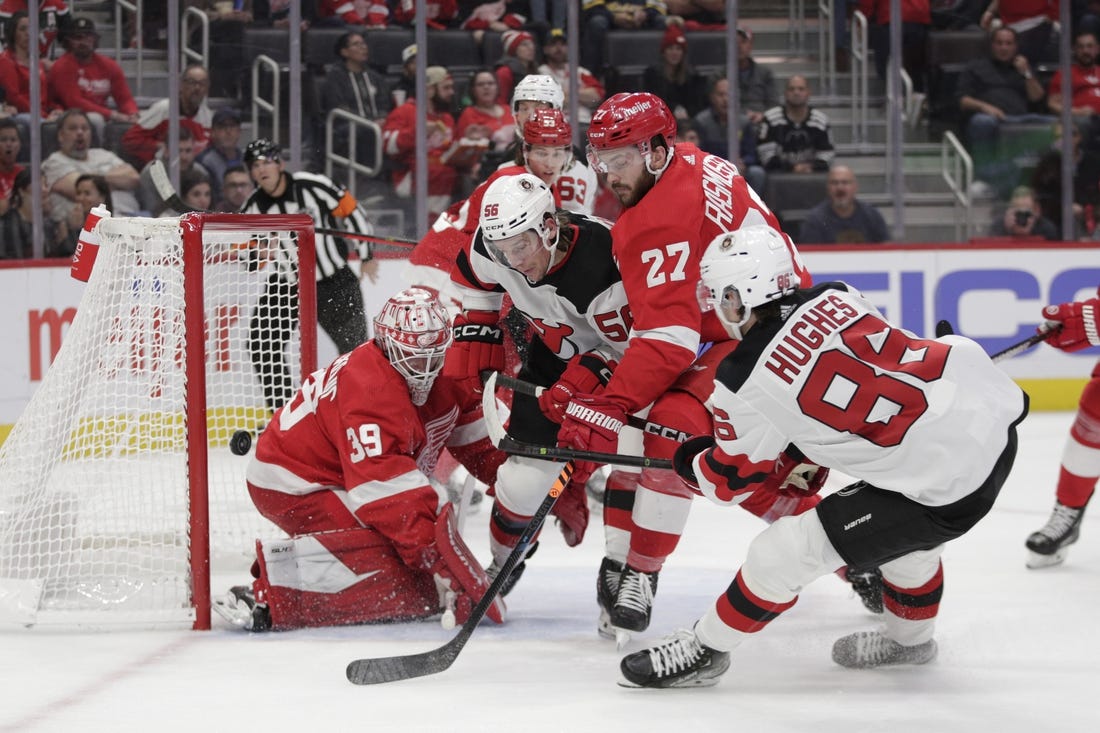 Oct 25, 2022; Detroit, Michigan, USA; Jack Hughes #86 of the New Jersey Devils scores a goal during the first period of the game against the Detroit Red Wings at Little Caesars Arena. Mandatory Credit: Brian Sevald-USA TODAY Sports