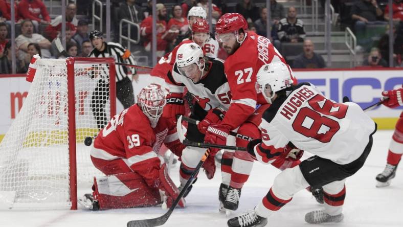 Oct 25, 2022; Detroit, Michigan, USA; Jack Hughes #86 of the New Jersey Devils scores a goal during the first period of the game against the Detroit Red Wings at Little Caesars Arena. Mandatory Credit: Brian Sevald-USA TODAY Sports