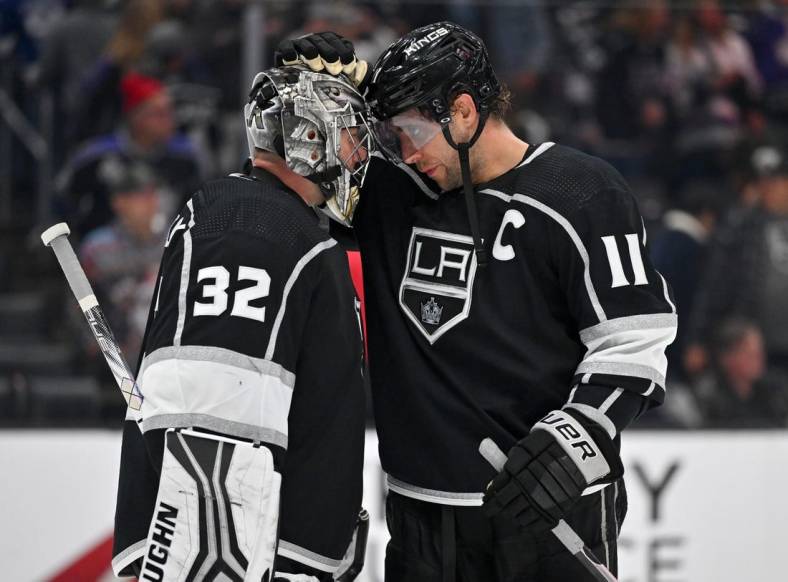 Oct 25, 2022; Los Angeles, California, USA;  Los Angeles Kings goaltender Jonathan Quick (32) is congratulated by center Anze Kopitar (11) after defeating the Tampa Bay Lightning at Crypto.com Arena. Mandatory Credit: Jayne Kamin-Oncea-USA TODAY Sports