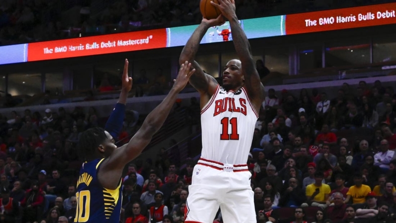 Oct 26, 2022; Chicago, Illinois, USA; Chicago Bulls forward DeMar DeRozan (11) shoots the ball over Indiana Pacers guard Bennedict Mathurin (00) during the first half at the  United Center. Mandatory Credit: Matt Marton-USA TODAY Sports