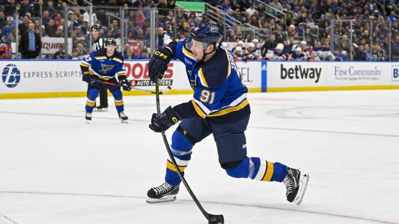 Oct 26, 2022; St. Louis, Missouri, USA;  St. Louis Blues right wing Vladimir Tarasenko (91) shoots against the Edmonton Oilers during the second period at Enterprise Center. Mandatory Credit: Jeff Curry-USA TODAY Sports