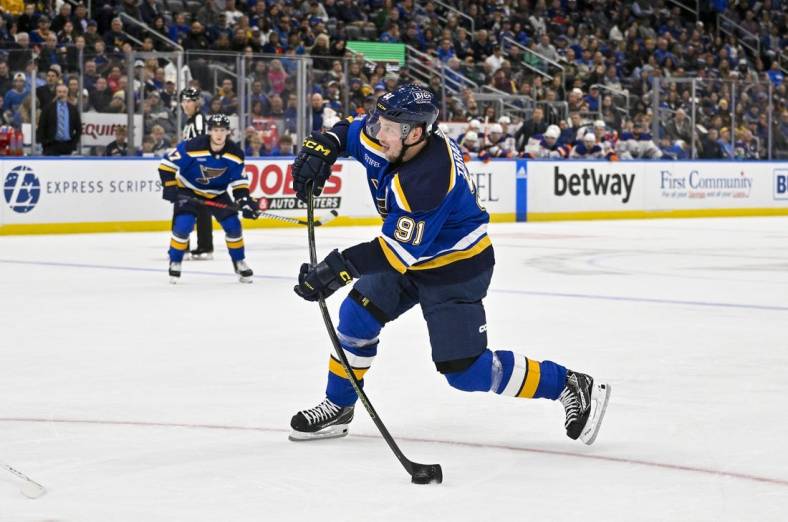 Oct 26, 2022; St. Louis, Missouri, USA;  St. Louis Blues right wing Vladimir Tarasenko (91) shoots against the Edmonton Oilers during the second period at Enterprise Center. Mandatory Credit: Jeff Curry-USA TODAY Sports