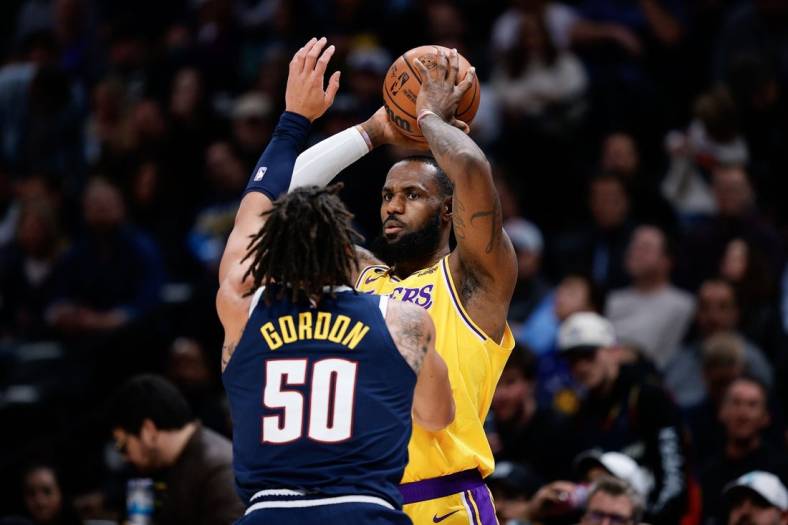 Oct 26, 2022; Denver, Colorado, USA; Los Angeles Lakers forward LeBron James (6) controls the ball as Denver Nuggets forward Aaron Gordon (50) guards in the first quarter at Ball Arena. Mandatory Credit: Isaiah J. Downing-USA TODAY Sports