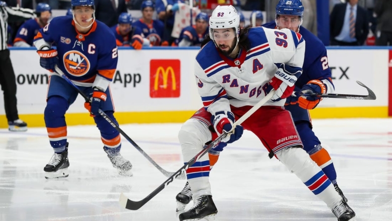 Oct 26, 2022; Elmont, New York, USA; New York Rangers center Mika Zibanejad (93) skates with the puck against the New York Islanders during the third period at UBS Arena. Mandatory Credit: Tom Horak-USA TODAY Sports
