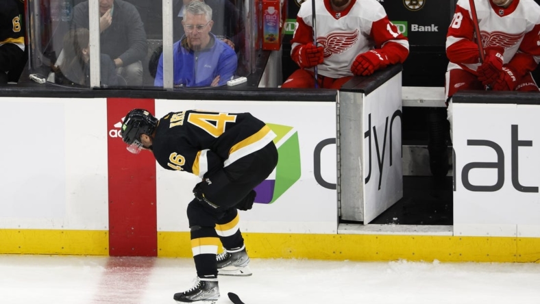 Oct 27, 2022; Boston, Massachusetts, USA; Boston Bruins center David Krejci (46) hunches over and leaves the ice after being injured against the Detroit Red Wings during the second period at TD Garden. Mandatory Credit: Winslow Townson-USA TODAY Sports