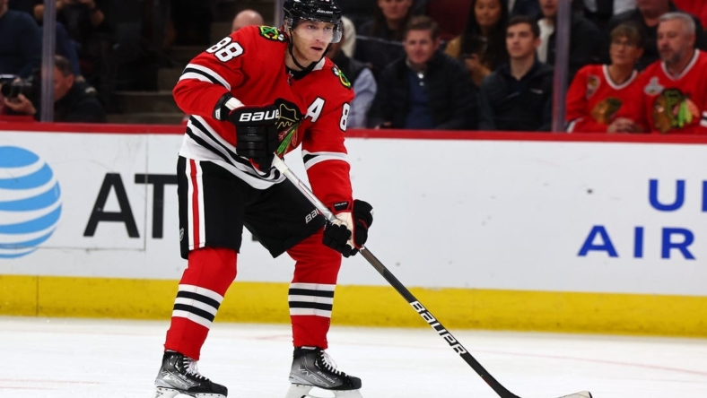 Oct 27, 2022; Chicago, Illinois, USA; Chicago Blackhawks right wing Patrick Kane (88) skates with the puck against the Edmonton Oilers during the first period at the United Center. Mandatory Credit: Mike Dinovo-USA TODAY Sports