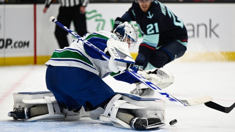 Oct 27, 2022; Seattle, Washington, USA; Vancouver Canucks goaltender Thatcher Demko (35) defends the goal against the Seattle Kraken during the first period at Climate Pledge Arena. Mandatory Credit: Steven Bisig-USA TODAY Sports