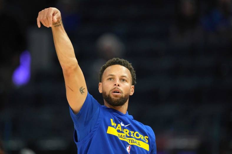 Oct 23, 2022; San Francisco, California, USA; Golden State Warriors guard Stephen Curry (30) warms up before the game against the Sacramento Kings at Chase Center. Mandatory Credit: Darren Yamashita-USA TODAY Sports