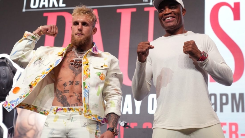 Jake Paul and Anderson Silva pose for photos during a news conference at Desert Diamond Arena on Thursday, Oct. 27, 2022 to preview their Saturday night fight.

Jake Paul 4