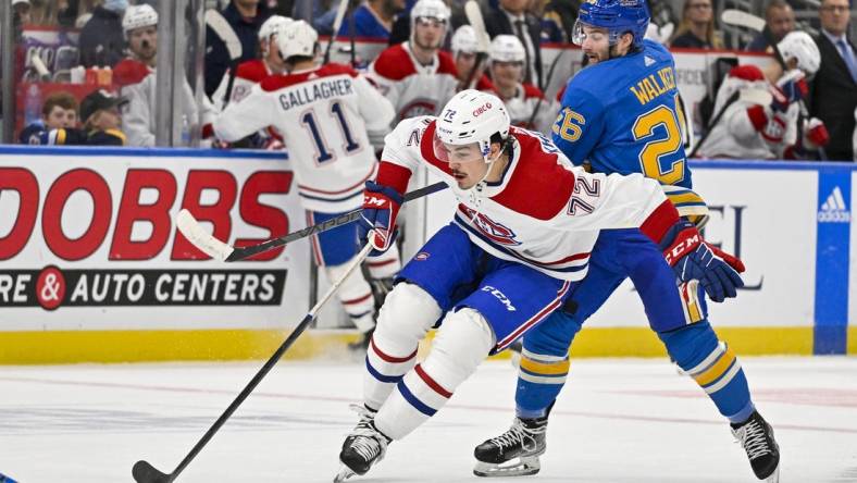 Oct 29, 2022; St. Louis, Missouri, USA;  Montreal Canadiens defenseman Arber Xhekaj (72) controls the puck against the St. Louis Blues during the first period at Enterprise Center. Mandatory Credit: Jeff Curry-USA TODAY Sports