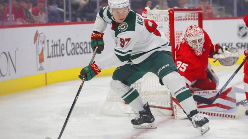 Oct 29, 2022; Detroit, Michigan, USA; Minnesota Wild left wing Kirill Kaprizov (97) handles the puck during the first period against the Detroit Red Wings at Little Caesars Arena. Mandatory Credit: Brian Sevald-USA TODAY Sports