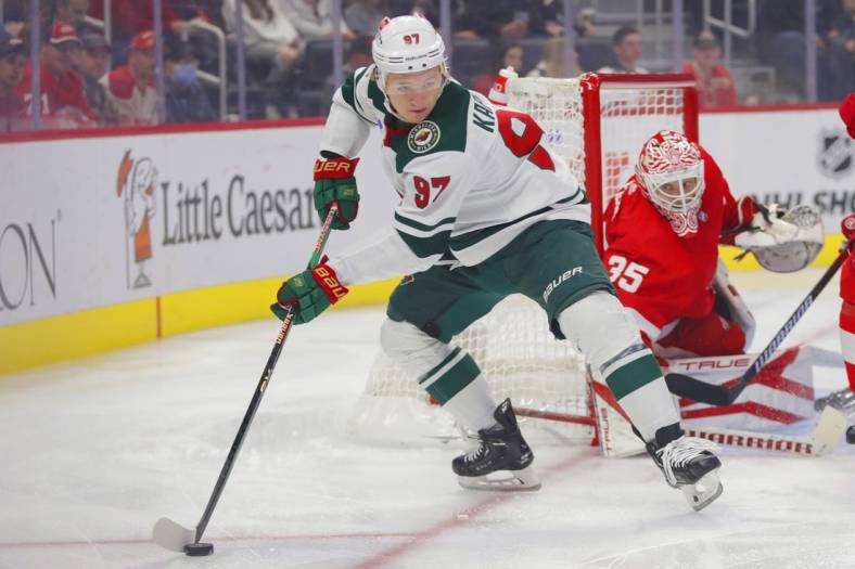 Oct 29, 2022; Detroit, Michigan, USA; Minnesota Wild left wing Kirill Kaprizov (97) handles the puck during the first period against the Detroit Red Wings at Little Caesars Arena. Mandatory Credit: Brian Sevald-USA TODAY Sports