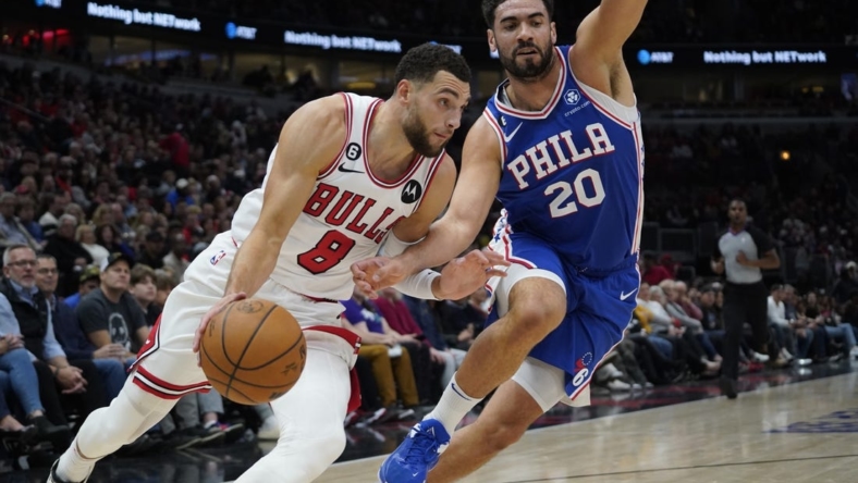 Oct 29, 2022; Chicago, Illinois, USA; Chicago Bulls guard Zach LaVine (8) drives to the basket against Philadelphia 76ers forward Georges Niang (20) during the first half at United Center. Mandatory Credit: David Banks-USA TODAY Sports