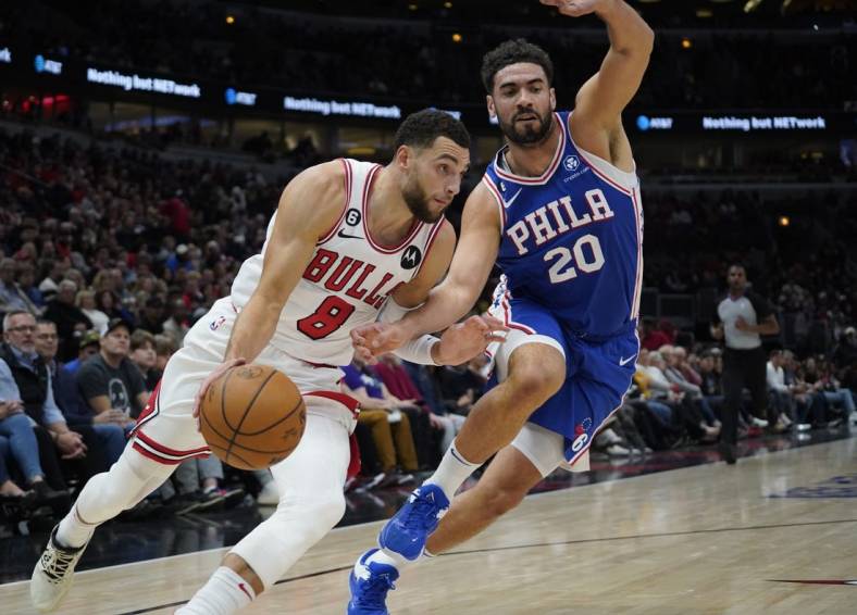 Oct 29, 2022; Chicago, Illinois, USA; Chicago Bulls guard Zach LaVine (8) drives to the basket against Philadelphia 76ers forward Georges Niang (20) during the first half at United Center. Mandatory Credit: David Banks-USA TODAY Sports