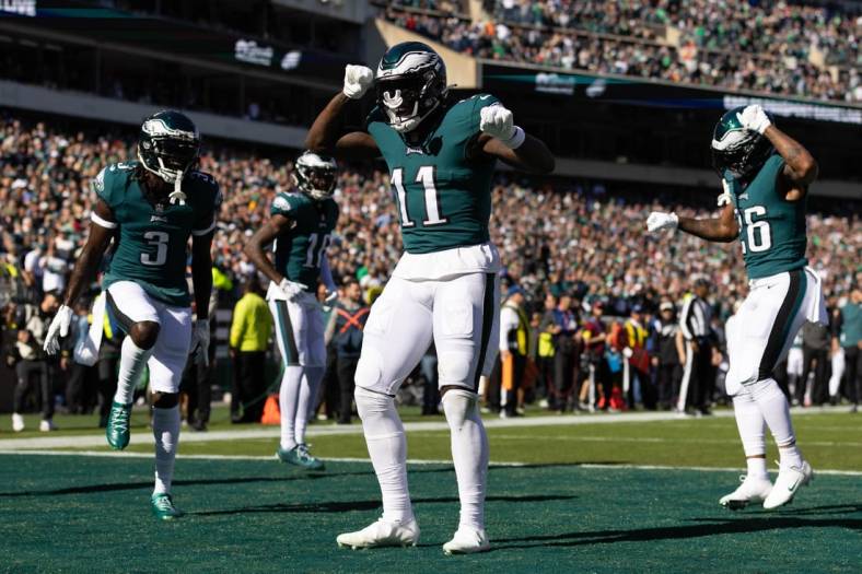 Oct 30, 2022; Philadelphia, Pennsylvania, USA; Philadelphia Eagles wide receiver A.J. Brown (11) celebrates with teammates after a touchdown catch during the first quarter against the Pittsburgh Steelers at Lincoln Financial Field. Mandatory Credit: Bill Streicher-USA TODAY Sports