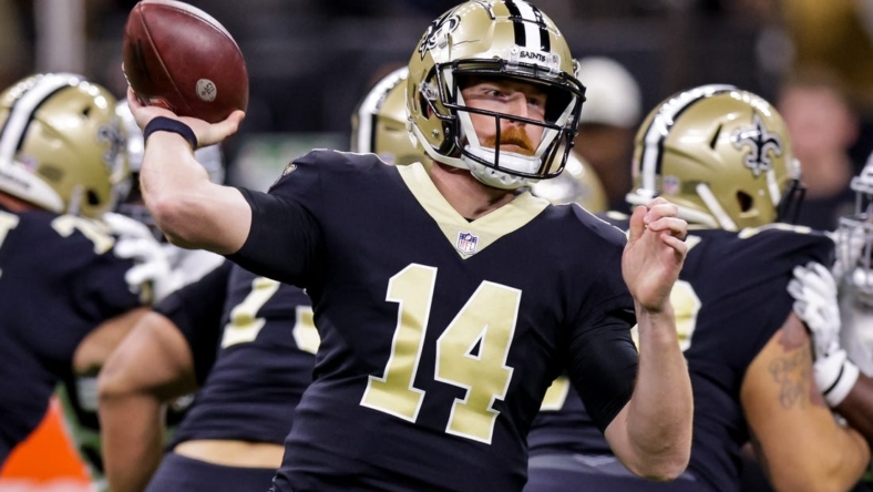 Oct 30, 2022; New Orleans, Louisiana, USA;  New Orleans Saints quarterback Andy Dalton (14) passes the ball against the Las Vegas Raiders during the first half at Caesars Superdome. Mandatory Credit: Stephen Lew-USA TODAY Sports