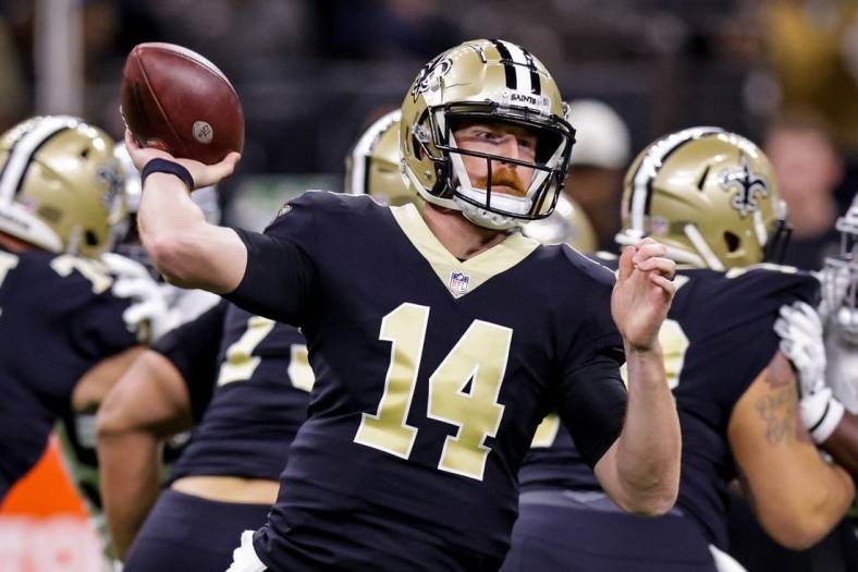 Oct 30, 2022; New Orleans, Louisiana, USA;  New Orleans Saints quarterback Andy Dalton (14) passes the ball against the Las Vegas Raiders during the first half at Caesars Superdome. Mandatory Credit: Stephen Lew-USA TODAY Sports