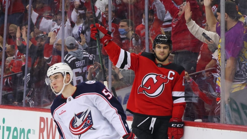 Oct 30, 2022; Newark, New Jersey, USA; New Jersey Devils center Nico Hischier (13) celebrates his goal against the Columbus Blue Jackets during the second period at Prudential Center. Mandatory Credit: Ed Mulholland-USA TODAY Sports