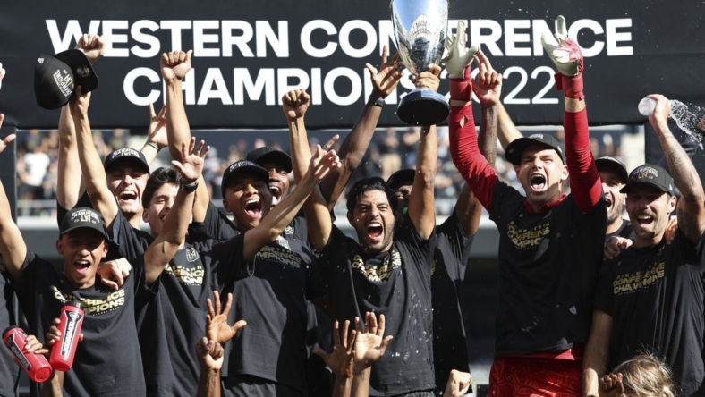 Oct 30, 2022; Los Angeles, California, USA; Los Angeles FC forward Carlos Vela (10) holds the cup as the Los Angeles FC celebrate the win over the Austin FC during the conference finals for the Audi 2022 MLS Cup Playoffs at Banc of California Stadium. Mandatory Credit: Kiyoshi Mio-USA TODAY Sports