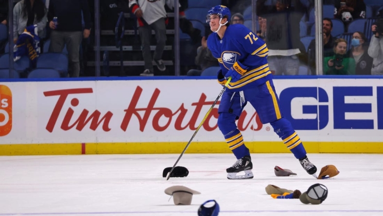Oct 31, 2022; Buffalo, New York, USA; Hats are thrown on the ice to celebrate Buffalo Sabres right wing Tage Thompson (72) third goal of the game during the third period against the Detroit Red Wings at KeyBank Center. Mandatory Credit: Timothy T. Ludwig-USA TODAY Sports