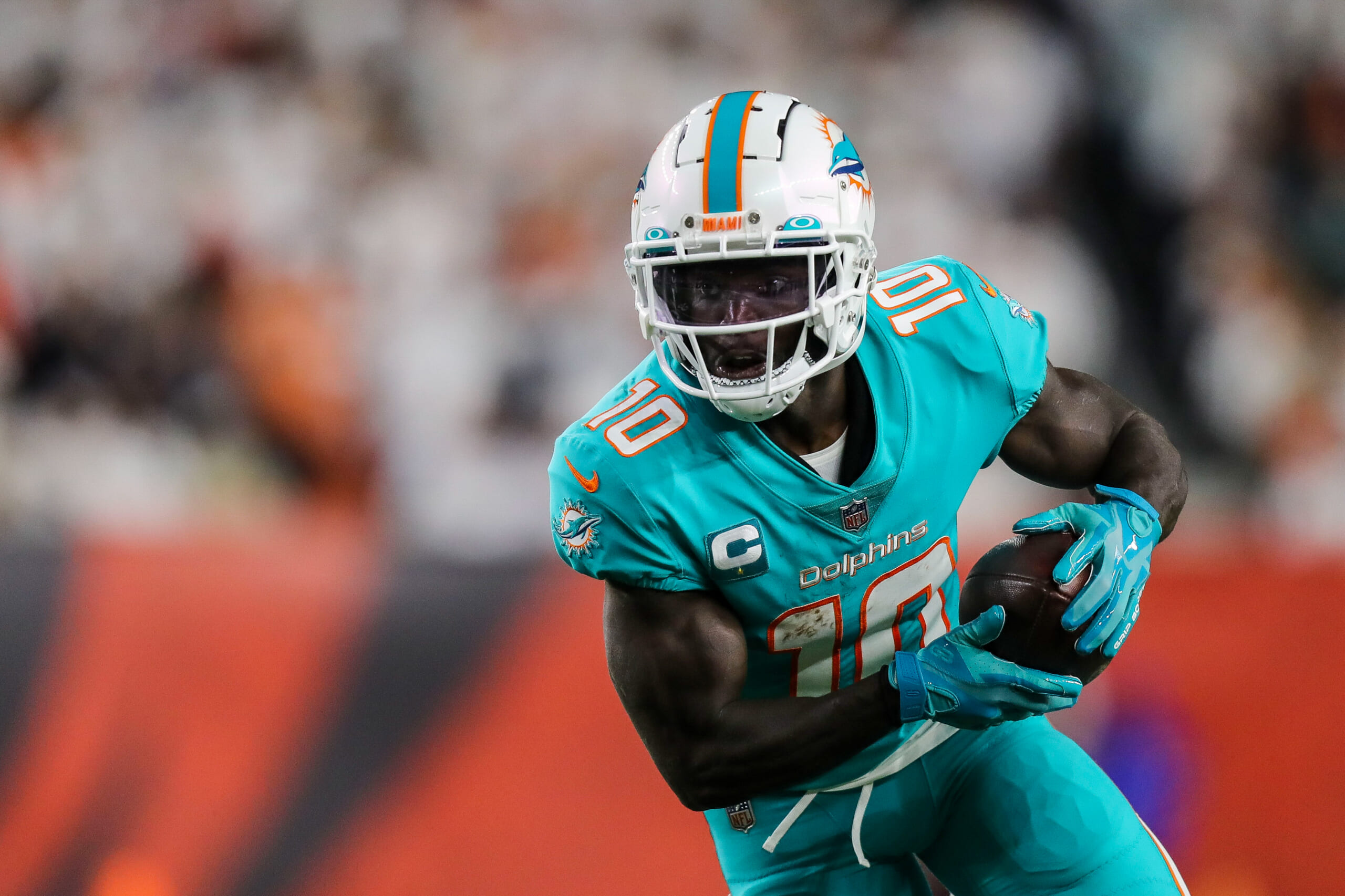 Miami Dolphins star Tyreek Hill in walking boot after suffering foot injury