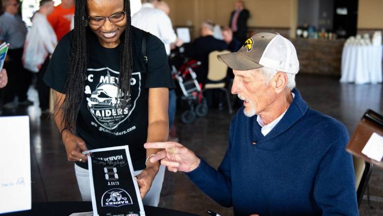 Hall of fame punter Ray Guy talks about the good old days with Niqui Hayden, Executive Director of the DC Metro Raiders during the 54th Annual York Area Sports Night, April 4, 2019 at the Heritage Hills Golf and Conference Center.

Ydr Cc 4 4 19 Sports Night