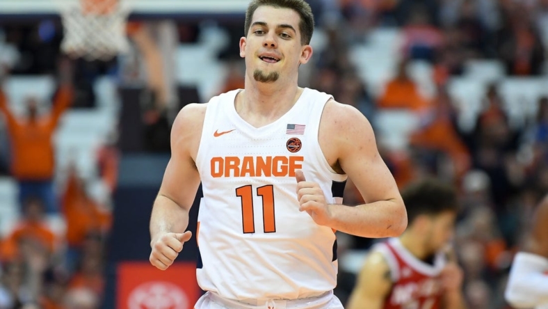 Feb 11, 2020; Syracuse, New York, USA; Syracuse Orange guard Joe Girard III (11) in action during the first half against the North Carolina State Wolfpack at the Carrier Dome. Mandatory Credit: Rich Barnes-USA TODAY Sports