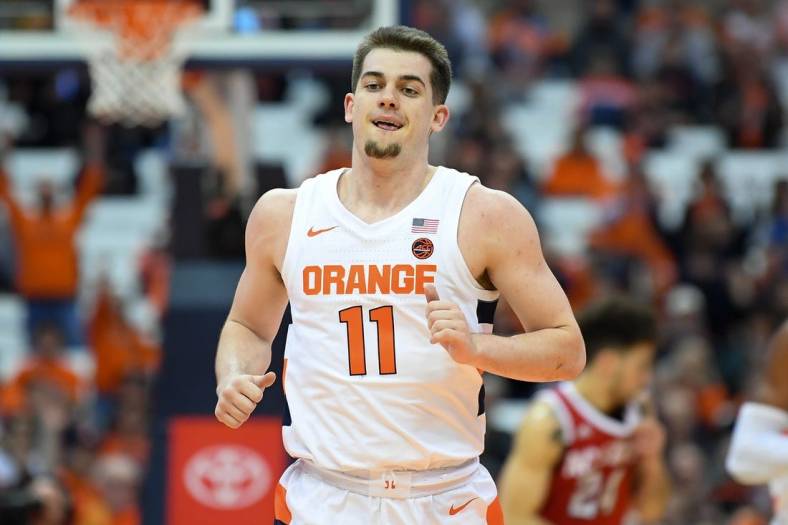 Feb 11, 2020; Syracuse, New York, USA; Syracuse Orange guard Joe Girard III (11) in action during the first half against the North Carolina State Wolfpack at the Carrier Dome. Mandatory Credit: Rich Barnes-USA TODAY Sports