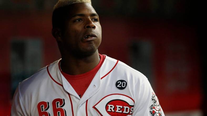 Cincinnati Reds right fielder Yasiel Puig (66) throws a handful of sunflower seeds into his mouth in the seventh inning of the MLB National League game between the Cincinnati Reds and the Chicago Cubs at Great American Ball Park in downtown Cincinnati on Tuesday, May 14, 2019. The Cubs took the first game of the series, 3-1.

Chicago Cubs At Cincinnati Reds