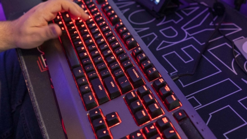 A backlit keyboard is part of the gear online video game streamer Jordan Woodruff uses in his Gilbert home.

Jordan Woodruff