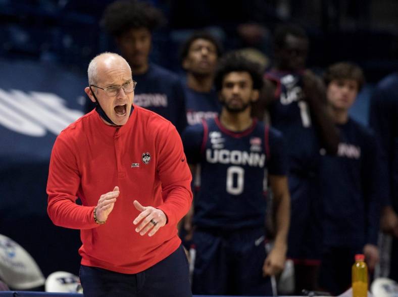 Connecticut Huskies head coach Dan Hurley yells for a stop in the second half of the NCAA men's basketball game between the Xavier Musketeers and the Connecticut Huskies on Saturday, Feb. 13, 2021, in Cincinnati.

Connecticut At Xavier