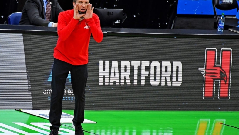Mar 19, 2021; Indianapolis, Indiana, USA; Hartford Hawks head coach John Gallagher yells out during the first half against the Baylor Bears in the first round of the 2021 NCAA Tournament at Lucas Oil Stadium. Mandatory Credit: Christopher Hanewinckel-USA TODAY Sports