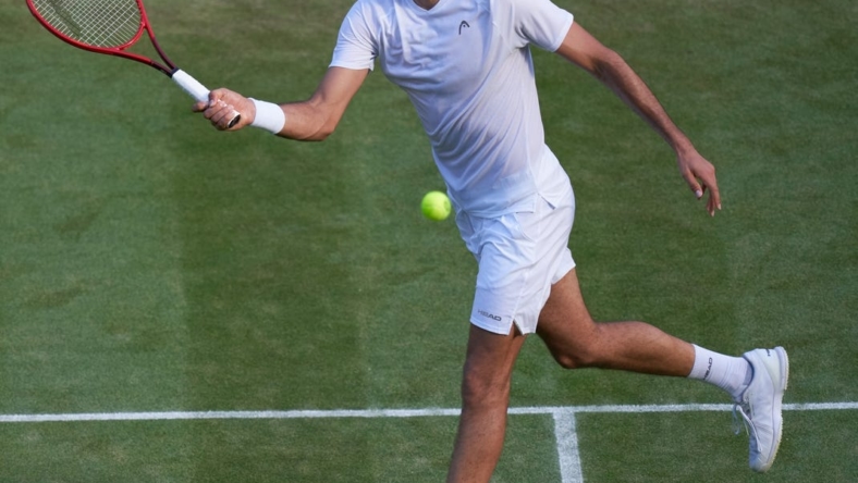 Jul 3, 2021; London, United Kingdom;  Marin Cilic (CRO) plays Daniil Medvedev (RUS)  on No 1 court in the men   s third round at All England Lawn Tennis and Croquet Club. Mandatory Credit: Peter van den Berg-USA TODAY Sports