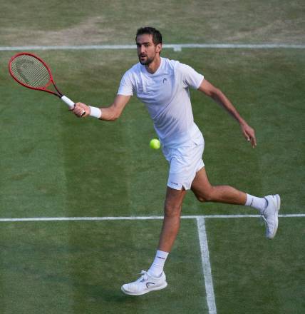 Jul 3, 2021; London, United Kingdom;  
Marin Cilic (CRO) plays Daniil Medvedev (RUS)  on No 1 court in the men   s third round at All England Lawn Tennis and Croquet Club. Mandatory Credit: Peter van den Berg-USA TODAY Sports