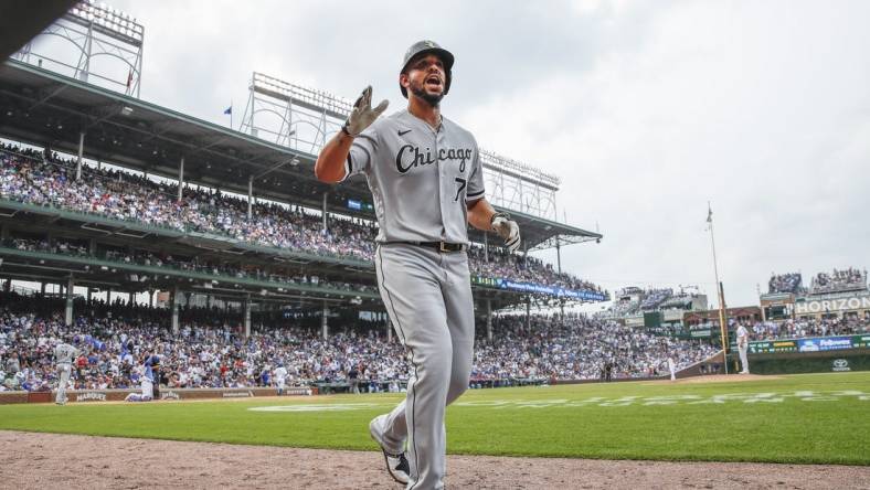 Aug 7, 2021; Chicago, Illinois, USA; Chicago White Sox first baseman Jose Abreu (79) celebrates after hitting a solo home run against the Chicago Cubs during the eight inning at Wrigley Field. Mandatory Credit: Kamil Krzaczynski-USA TODAY Sports