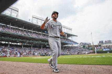 Aug 7, 2021; Chicago, Illinois, USA; Chicago White Sox first baseman Jose Abreu (79) celebrates after hitting a solo home run against the Chicago Cubs during the eight inning at Wrigley Field. Mandatory Credit: Kamil Krzaczynski-USA TODAY Sports