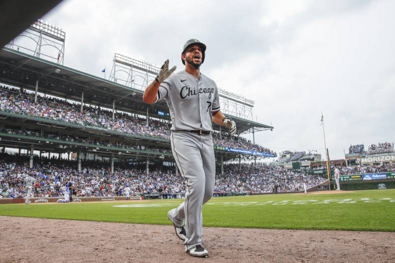 Aug 7, 2021; Chicago, Illinois, USA; Chicago White Sox first baseman Jose Abreu (79) celebrates after hitting a solo home run against the Chicago Cubs during the eight inning at Wrigley Field. Mandatory Credit: Kamil Krzaczynski-USA TODAY Sports