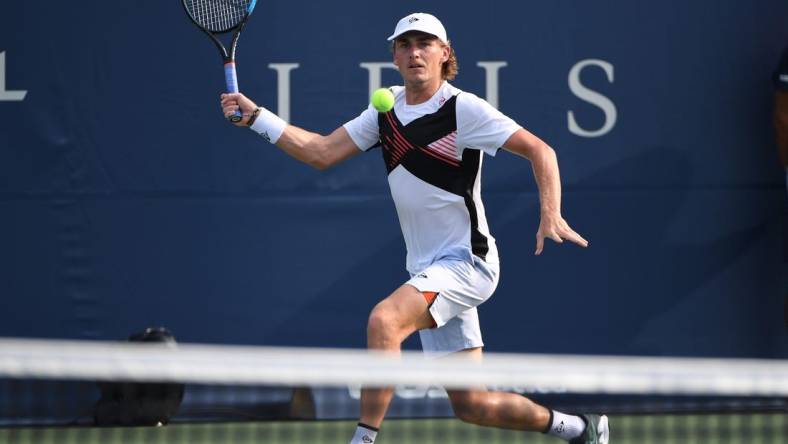 Aug 7, 2021; Toronto, Ontario, Canada; Max Purcell of Australia plays a shot against Emilio Gomez of Ecuador in first round qualifying play for the National Bank Open at the Aviva Centre. Mandatory Credit: Dan Hamilton-USA TODAY Sports