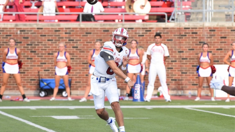 SMU quarterback Tanner Mordecai (8) lets go of a pass during Saturday's game against ACU at Gerald J. Ford Stadium in Dallas on Sept. 4, 2021. Mordecai threw an SMU-record seven touchdowns as the Mustangs won 56-9.

Hof 7364 2