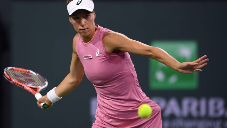 Oct 9, 2021; Indian Wells, CA, USA; Viktorija Golubic (SUI) hits a shot against Maria Sakkari (GRE) at Indian Wells Tennis Garden. Mandatory Credit: Orlando Ramirez-USA TODAY Sports