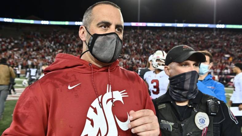 Oct 16, 2021; Pullman, Washington, USA; Washington State Cougars head coach Nick Rolovich celebrates after a game against the Stanford Cardinal at Gesa Field at Martin Stadium. The Cougars won 34-31. Mandatory Credit: James Snook-USA TODAY Sports