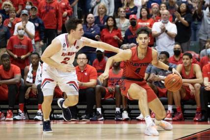 Nov 28, 2021; Orlando, FL, USA; Dayton Flyers guard Koby Brea (4) dribbles the ball against the Belmont Bruins in the second half at HP Field House. Mandatory Credit: Jeremy Reper-USA TODAY Sports
