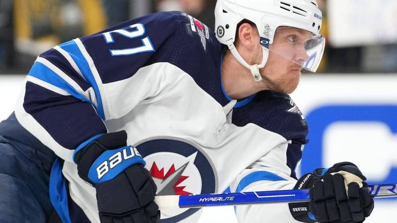 Jan 2, 2022; Las Vegas, Nevada, USA; Winnipeg Jets left wing Nikolaj Ehlers (27) warms up before a game against the Vegas Golden Knights at T-Mobile Arena. Mandatory Credit: Stephen R. Sylvanie-USA TODAY Sports