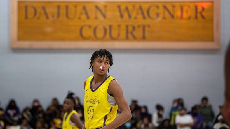 Camden's D.J. Wagner (21) returns to the game after being tended to for a nose bleed against Roselle Catholic Friday, Dec. 17, 2021 in Camden, NJ. Camden won 67-64.

Jl Camden Roselle 121721 01

Syndication Courier Post