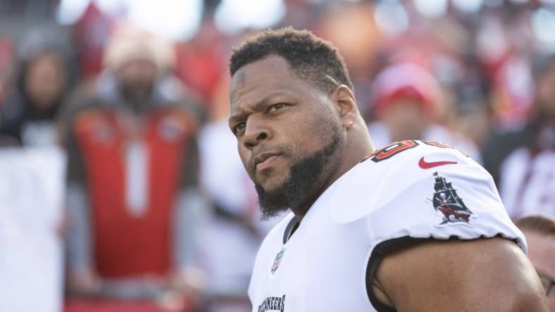 Jan 23, 2022; Tampa, Florida, USA; Tampa Bay Buccaneers defensive end Ndamukong Suh (93) walks onto the field before the game against the Los Angeles Rams during a NFC Divisional playoff football game at Raymond James Stadium. Mandatory Credit: Matt Pendleton-USA TODAY Sports